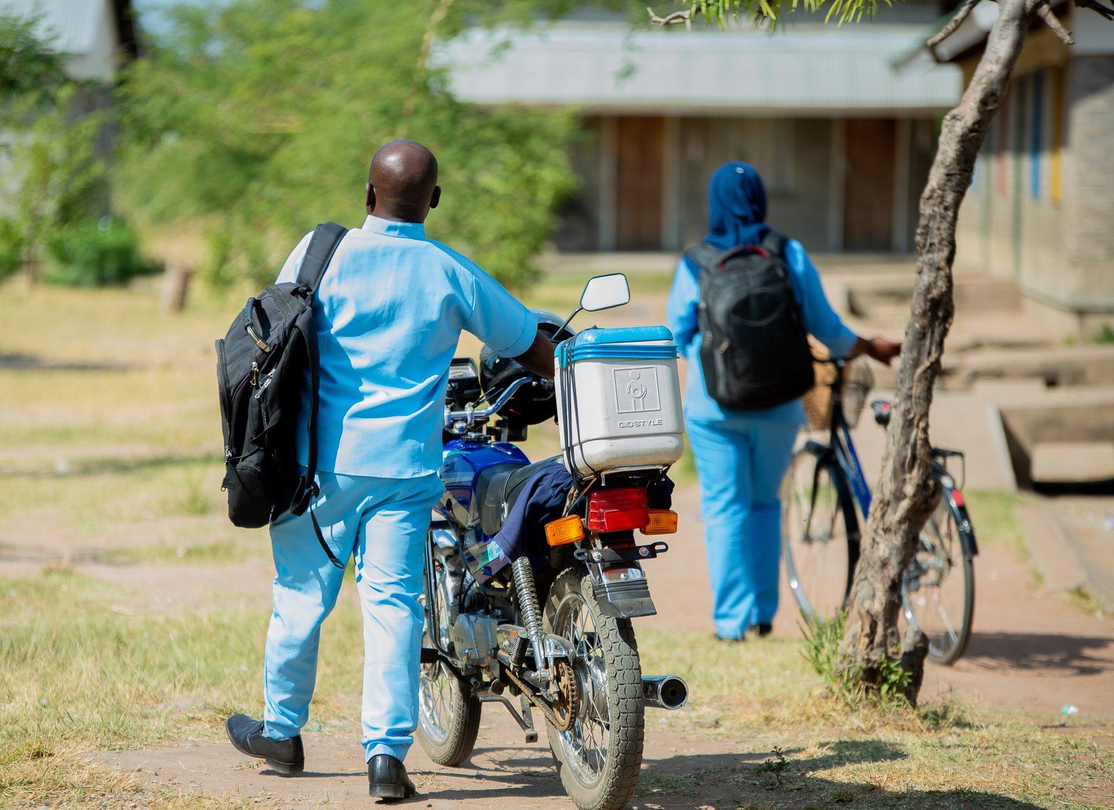 Photo: Carrying typhoid conjugate vaccines in insulated containers during an immunization campaign in Malawi. Credit: TyVAC/Madalitso Mvula